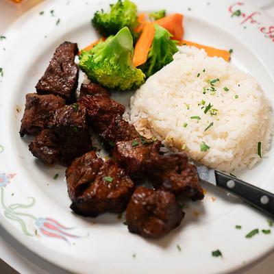 Grilled ribeye chunks, with rice and veggies.