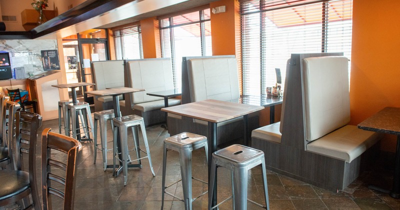 Dining space, booths, tall tables and bar stools