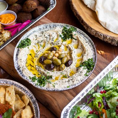 Dishes with various food on brown table