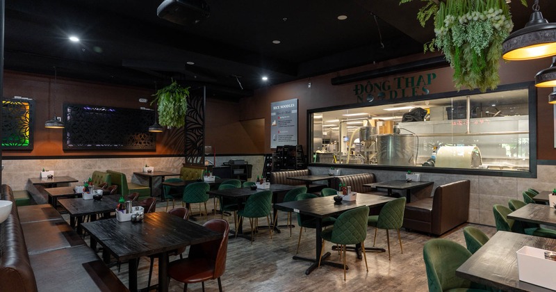 Interior, spacious dining area with tables and chairs