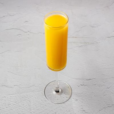 Glass of Mimosa.