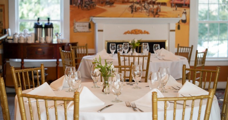 Interior, a set table with a white tablecloth and tableware