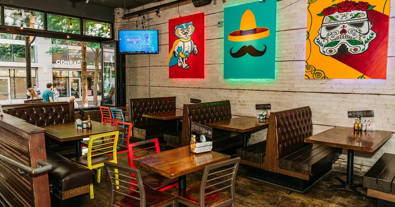 Interior space, seating area, tables, chairs and booths