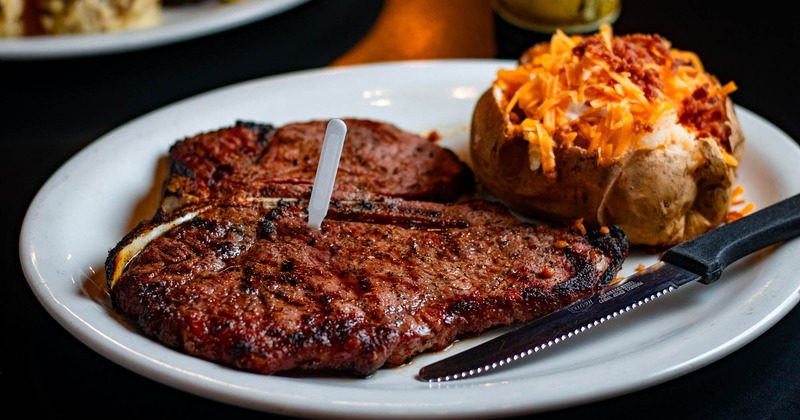 Grilled T bone steak and a baked potato