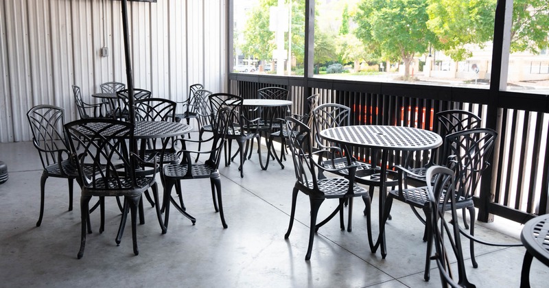 Outdoor seating area, tables and chairs