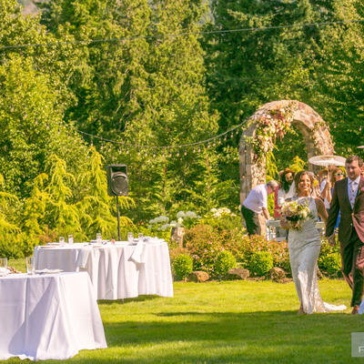 Bride anf groom walking towards their table