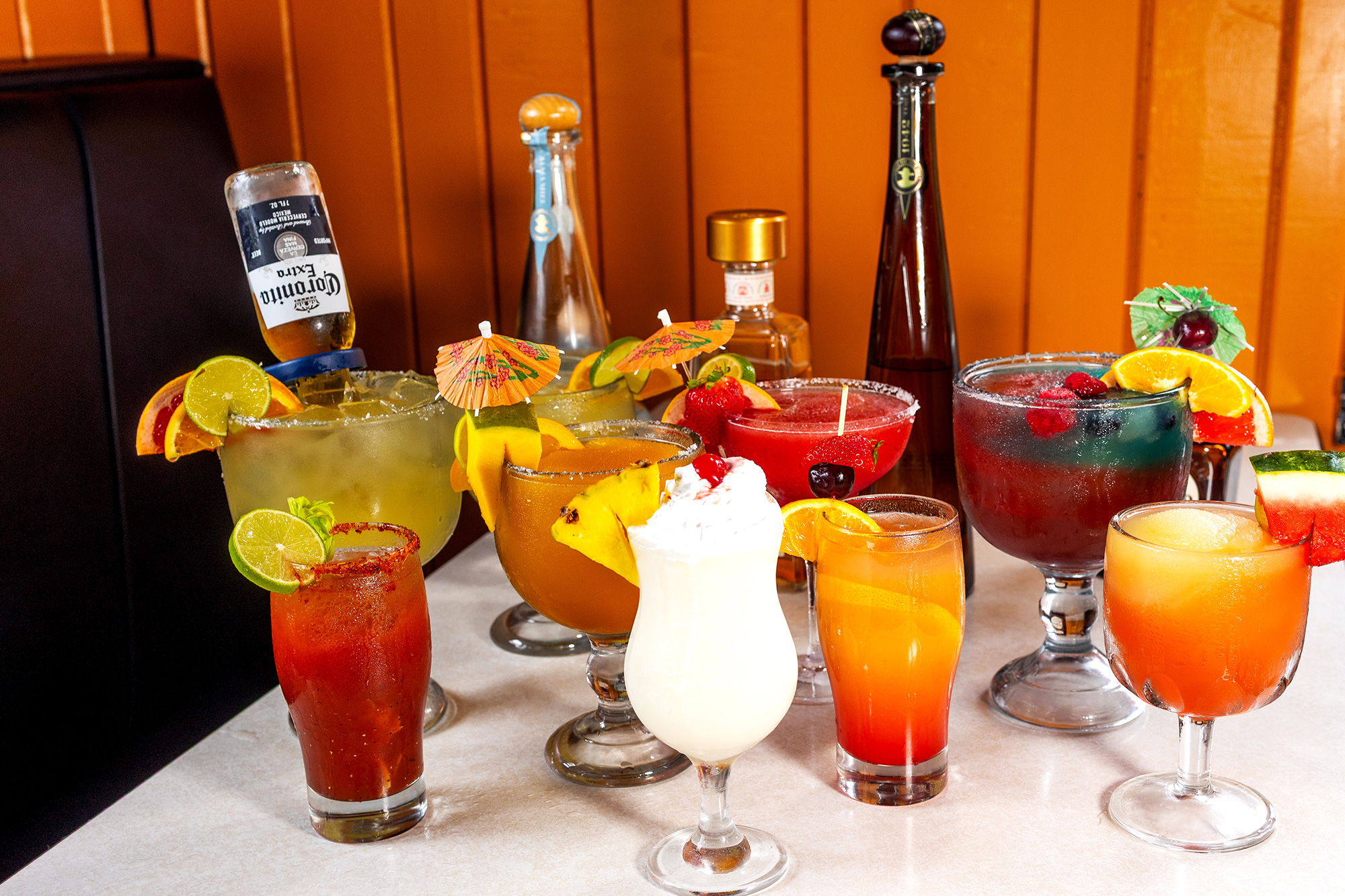 Various bottles and served drinks