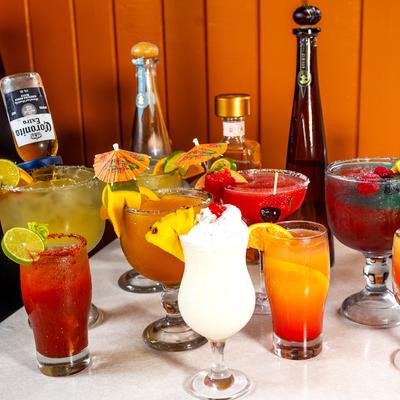 Various bottles and served drinks.