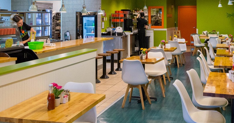 Interior, dining area, staff in action