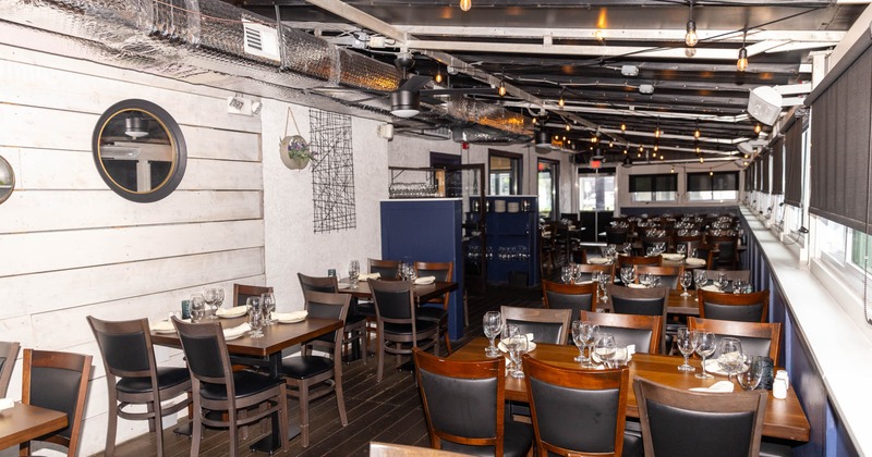 Interior, chairs and tables set and ready for guests