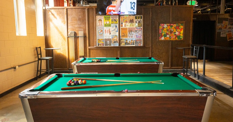 Pool tables room, screens above