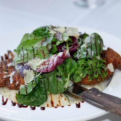 Deep fried chicken with spring mix and balsamic.