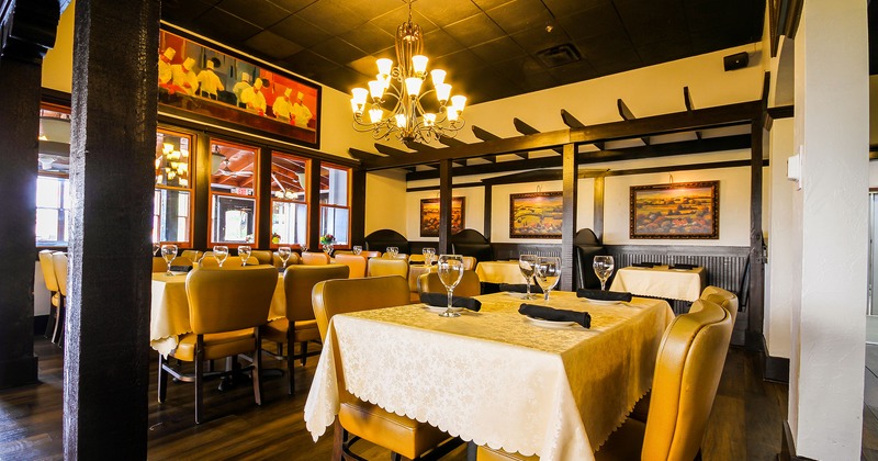 Restaurant interior, dining room with set tables