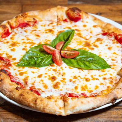 Pizza Margherita: Tomato sauce, mozzarella cheese and basil