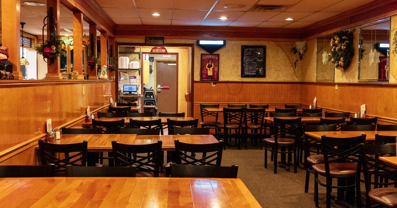 Dining room with wooden tables and chairs