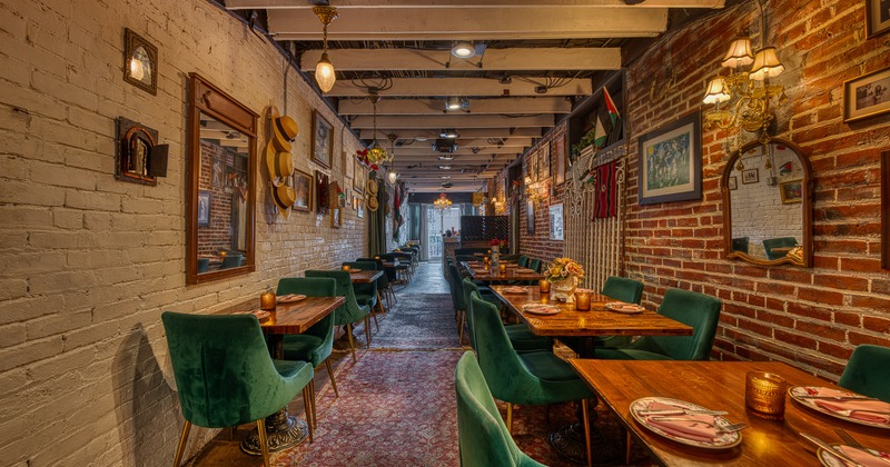 Cozy and stylish restaurant interior with a long and narrow dining area