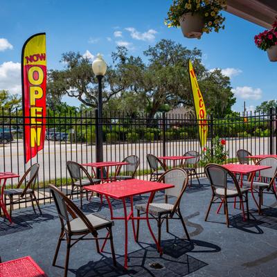 Tables and chairs outside.