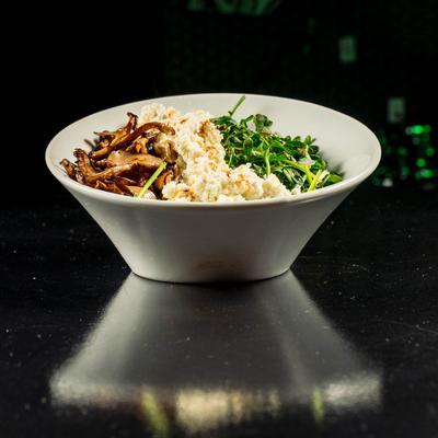 Arugula salad, with warm goat cheese, mushrooms, and vinaigrette.