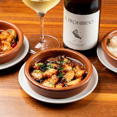 Sauteed octopus and wine.