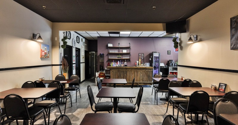 Interior, seating area with tables and chairs