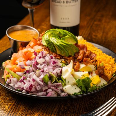 Cobb salad with dressing on the side.