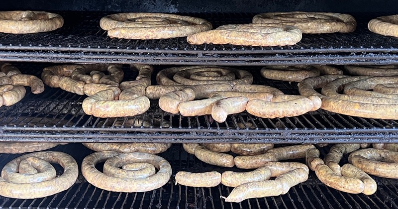 Sausage links on the grill