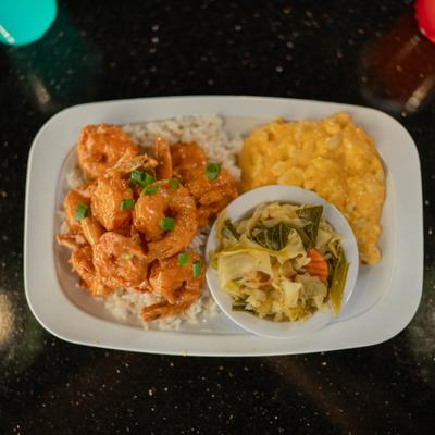 Bang Bang shrimp with rice, cabbage, and mac and cheese.