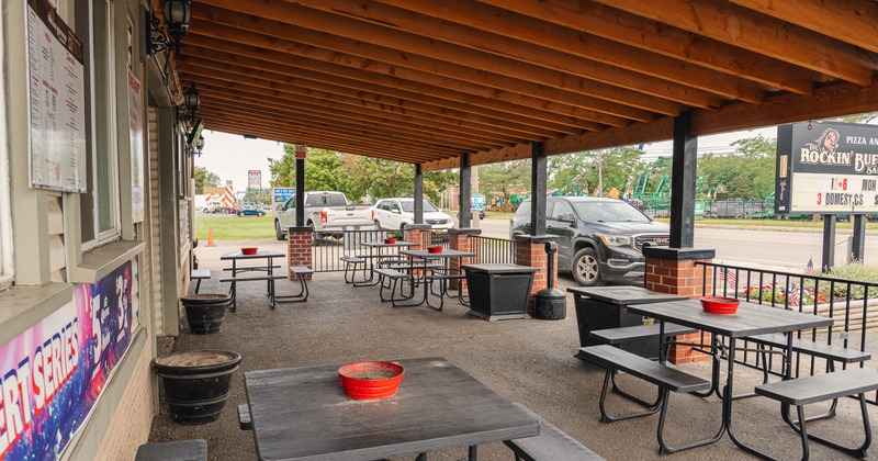 Exterior,  patio, terrace tables, chairs