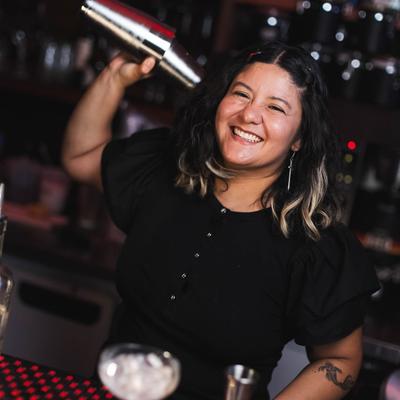 A staff member smiling.