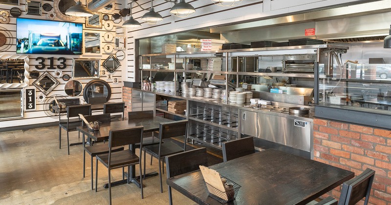 Interior, lined up dining tables near the order counter
