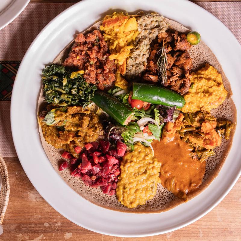 Ethiopian food served atop injera flatbread.