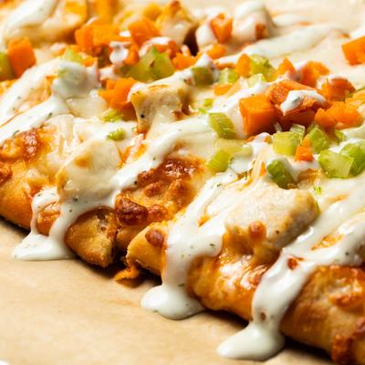 Buffalo chicken flatbread, closeup.
