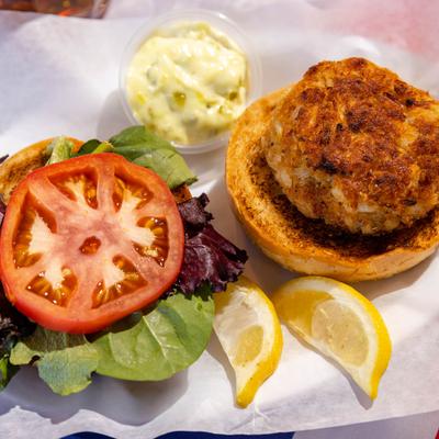 Crab Cake Sandwich with lettuce, tomato, slaw