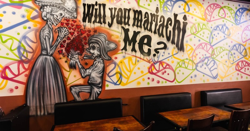 Interior, dining area, mural on the wall