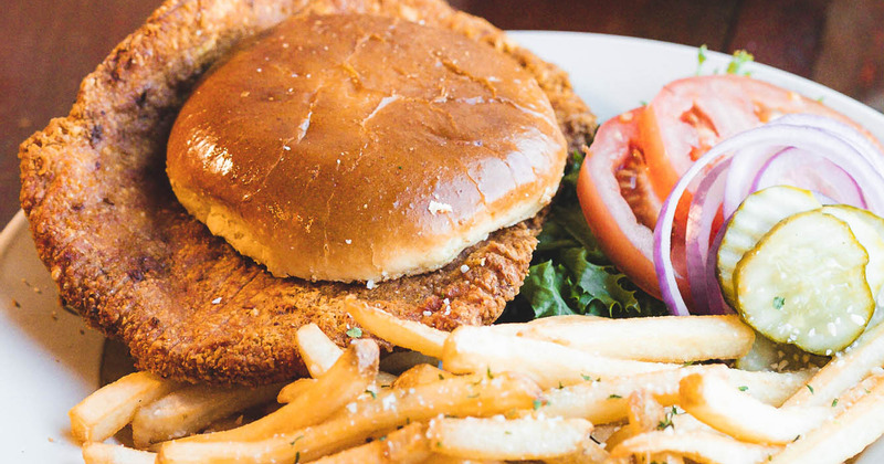 Goldfish Tenderloin Burger served with fries