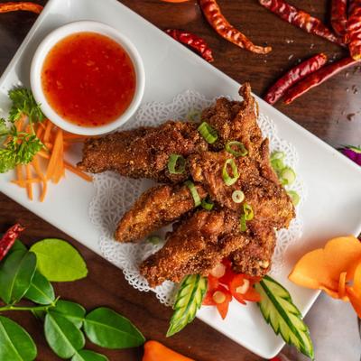 Zapp Wings served with sweet and sour sauce.