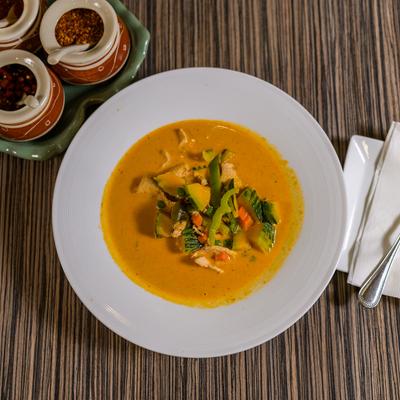 Pumpkin Curry, with coconut milk, bell peppers, peas, carrots, and Thai basil.