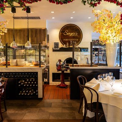 Dining table, view of the kitchen.