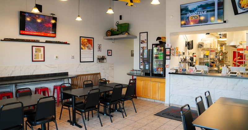 Interior, dining area, checkout counter, kitchen in the back, tile flooring