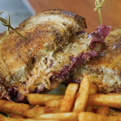Reuben sandwich and crispy fries.