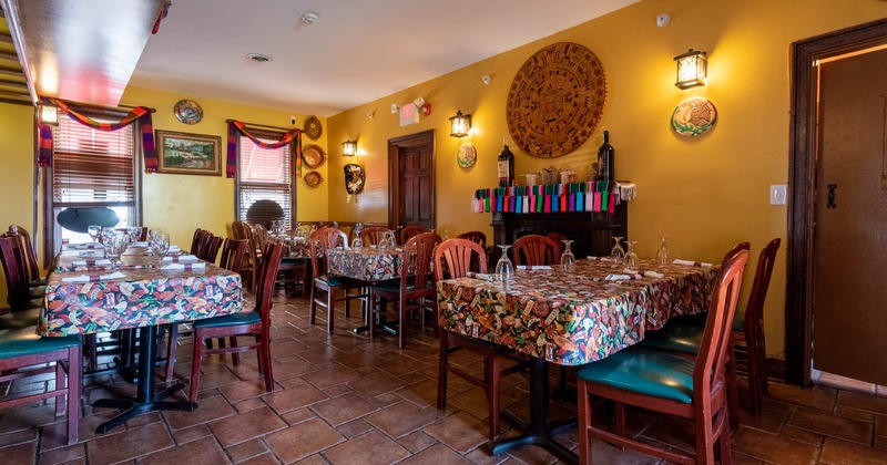 Interior, dining area, tables and chairs ready for guests