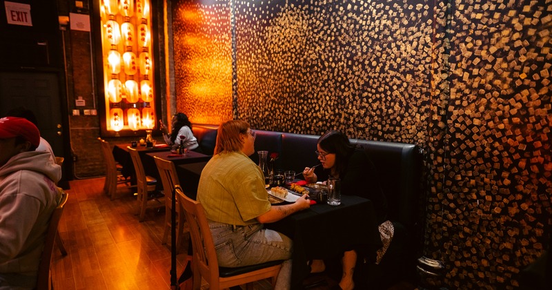 Diner area, tables and booths, guests eating