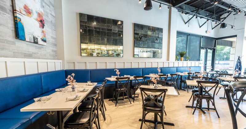 Interior, seating area with tables and tableware