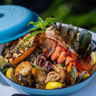 Seafood paella with lobster, mussels and shrimp.