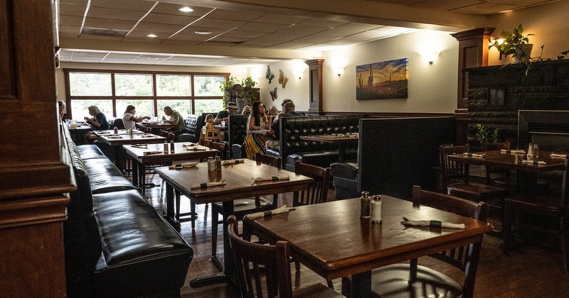 Interior space, dining area, tables ready for guests