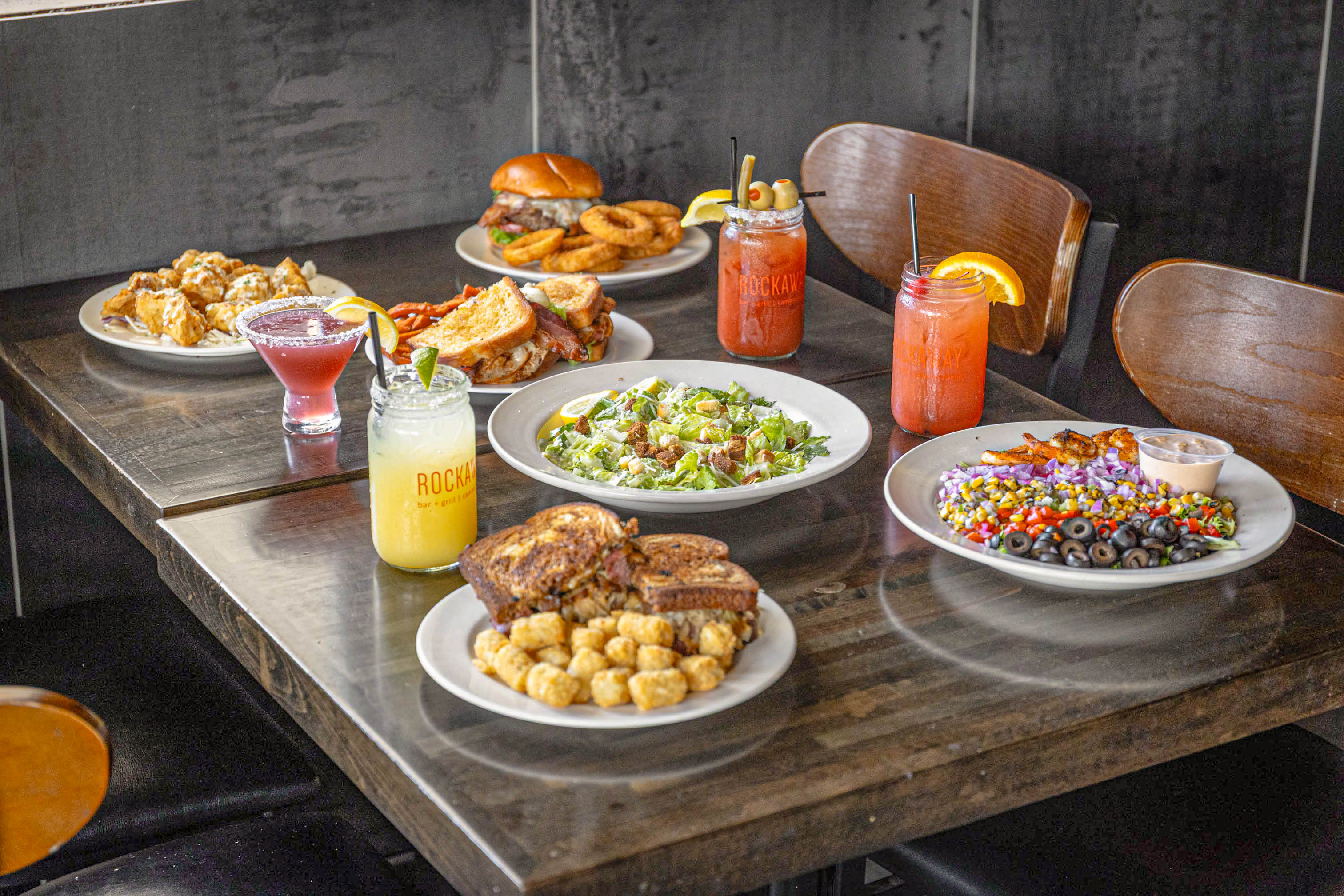Rockaway Food & Drinks spread on table.