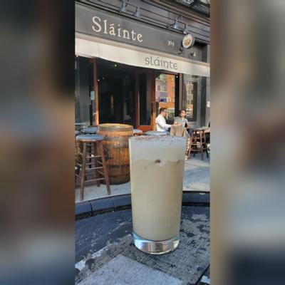 A glass of milkshake.