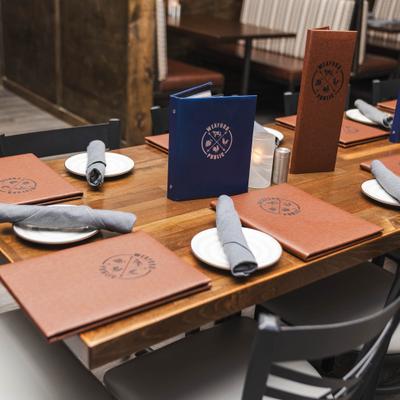 Table set with menus and napkins.