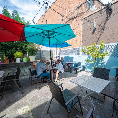 Outdoor patio scene, relaxed ambiance.