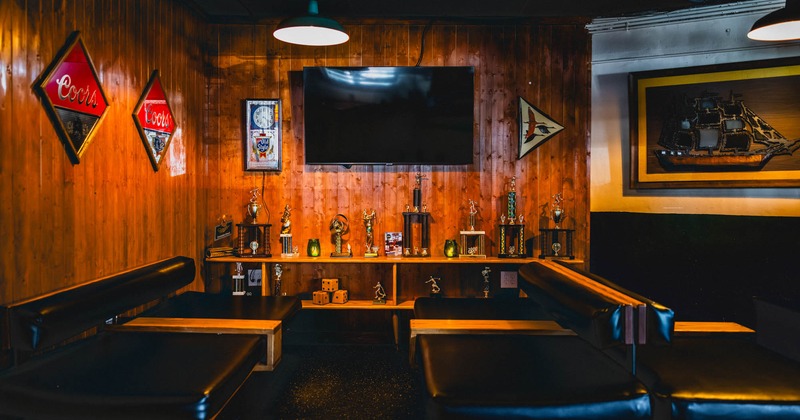 Interior, seating area, TV on the wall